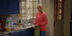 Mom In The Kitchen Pat On The Back GIF