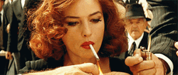 Monica Bellucci Puffing Smoke GIF