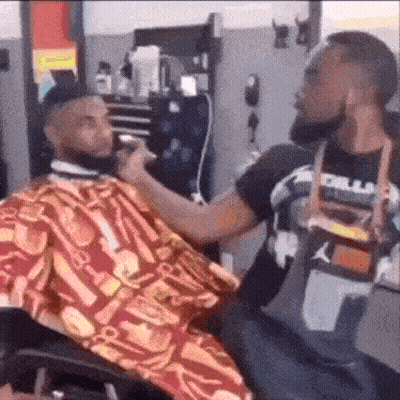 Monkey Getting Haircut By Man GIF