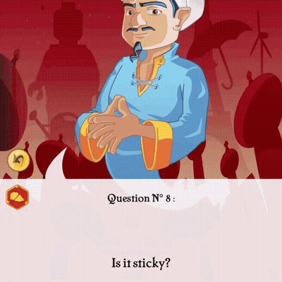 Monkey Holding Wallet In Mouth Sitting On Ground GIF
