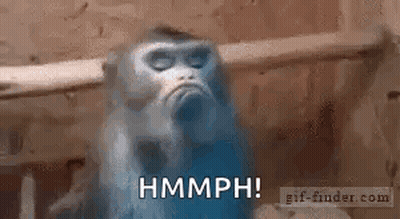 Monkey In Cage Making Funny Face Saying Hmph GIF