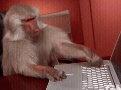 Monkey Typing On Laptop With TM GIF