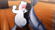 Monokuma Beating Up A Penguin GIF
