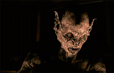 Monster Face With Red Eyes GIF