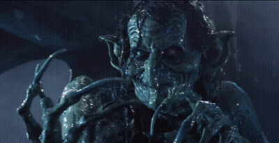 Monster Face With Spider In Mouth GIF