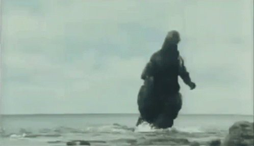 Monster In Water Saying Godzilla Dab GIF