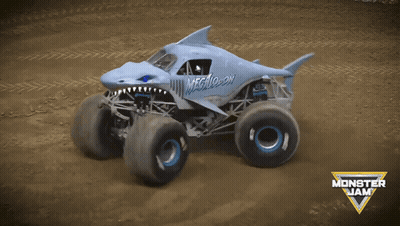 Monster Jam Shark Truck Driving In Dirt GIF