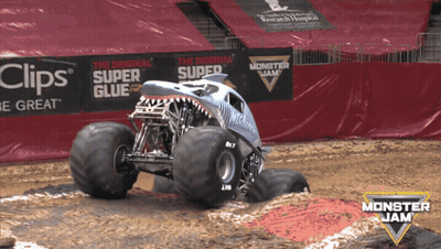 Monster Jam Truck Driving Through Mud GIF