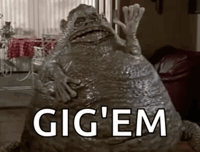 Monster Statue With Gig 'Em In Living Room GIF