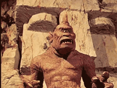 Monster Statue With Mohawk GIF
