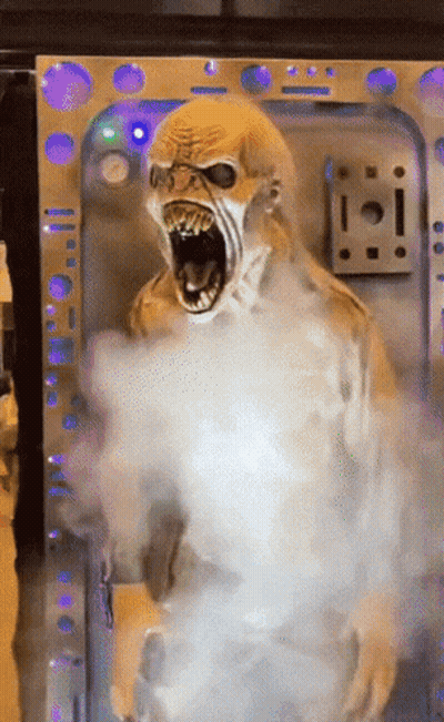 Monster Statue With Open Mouth And Smoke GIF