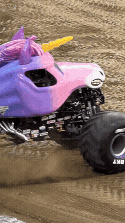 Monster Truck In Pink And Purple Unicorn Costume GIF