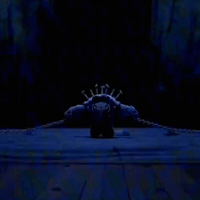 Monster With Crown Of Bones On Blue Surface GIF
