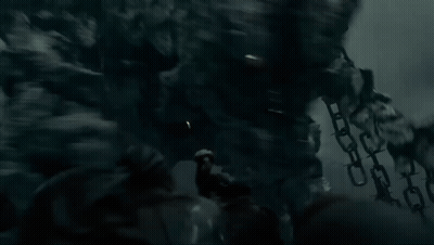 Monster With Huge Head And Arms In Dark GIF