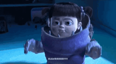 Monsters Inc Character In Purple Suit Making Face GIF