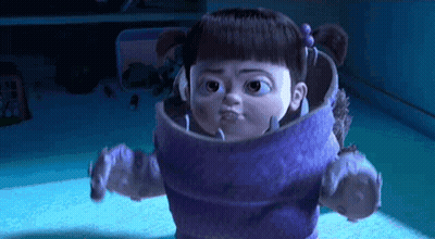 Monsters Inc Character In Purple Suit Making Funny Face GIF