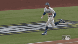 Mookie Betts Running Into The Field GIF