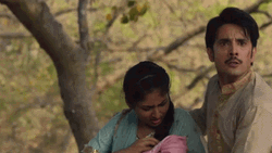 Mother And Baby Pushed To Side GIF