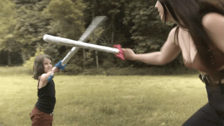 Mother And Daughter Sword Fighting GIF