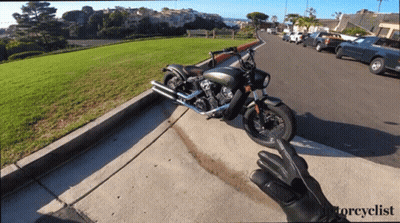 Motorcycle Parked Beside Glove Saying Motorcyclist GIF