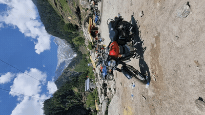 Motorcycle Parked On Dirt Road GIF