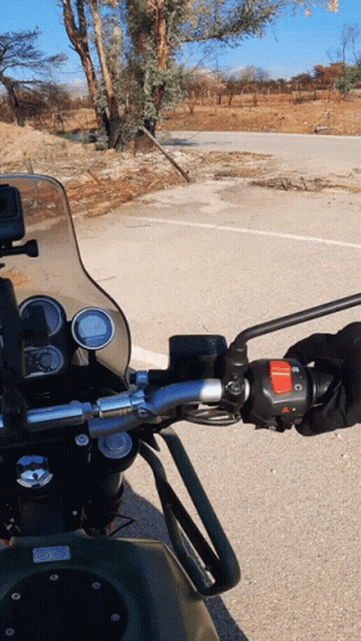 Motorcycle Parked On Road With Cycle World GIF