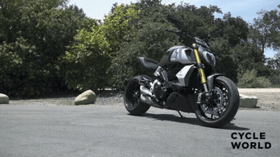 Motorcycle Parked On Road With Cycle World GIF