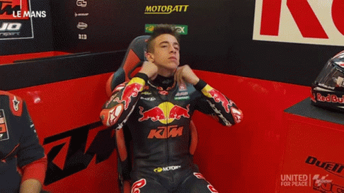 Motorcycle Racer With Crossed Arms Championship Sign GIF