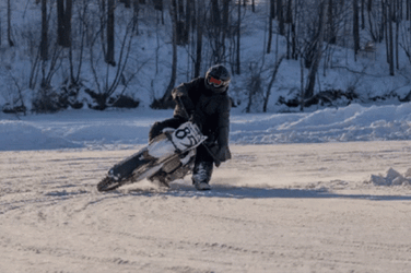 Motorcycle Slipping On Ice While On Race GIF