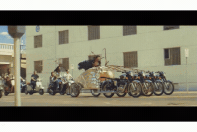 Motorcycles Parked In Front Of No Parking Sign GIF