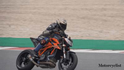 Motorcyclist Riding Motorcycle On Track GIF