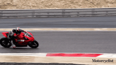 Motorcyclist Riding Red Motorcycle GIF
