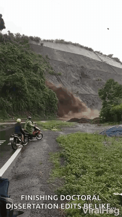 Motorcyclists Riding Past Rock Slide GIF