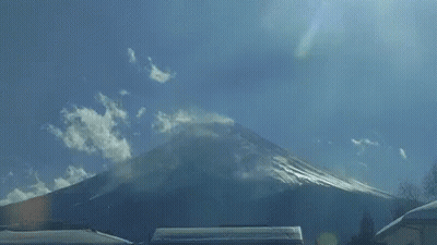 Mountain Under Blue Sky And Clouds GIF