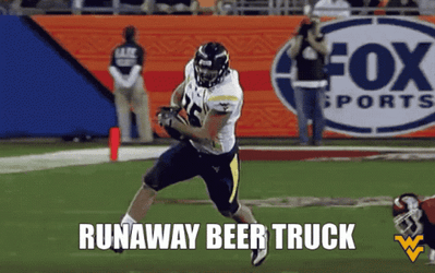 Mountaineers Player Running Holding Ball GIF