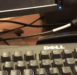 Mouse Hiding Under A Computer Screen GIF