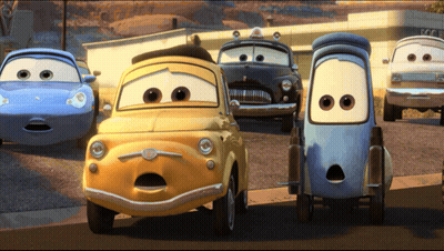 Movie Cars Lined Up On Road GIF