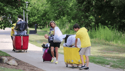 Moving Day College Students Drag Cart GIF