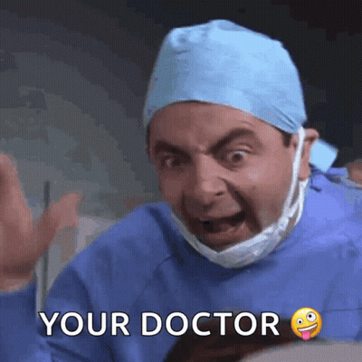 Mr Bean In Surgical Gown And Mask Saying Your Doctor GIF