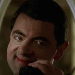 Mr Bean Licking The Razor After Shaving GIF