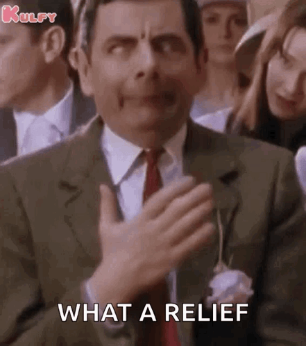 Mr Bean Making Funny Face Saying What GIF
