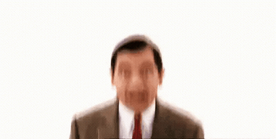 Mr Bean Smiling in Suit and Tie