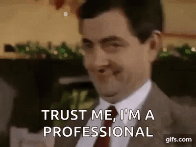 Mr Bean Smiling Saying Trust Me I'm A Professional GIF