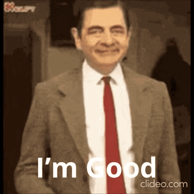Mr Bean Smiling Suit Tie Saying I'm Good GIF