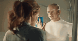 Mr Clean And Woman Wiping Mirror  GIF