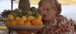 Mrs Doubtfire Throws Fruit On Pierce Brosnan GIF