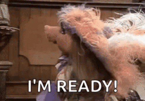 Mrs. Piggy From The Muppet Show Is Holding A Dog And Saying `` I 'M Ready ! '' GIF