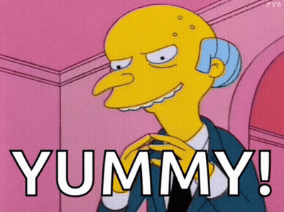 Mrs. Simpson From The Simpsons Is Smiling And Saying Yummy ! GIF