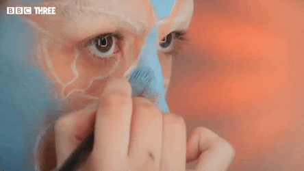 Mua Puts Blue Make Up Face Paint GIF