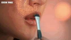 Mua Puts Glitter On Lips GIF